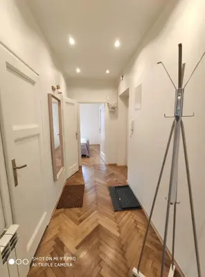 a hallway with a camera tripod in a room at Barska 21 by Homeprime in Kraków