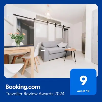 a living room with a couch and a table at M6 Main Square Stylish One Bedroom in Kraków