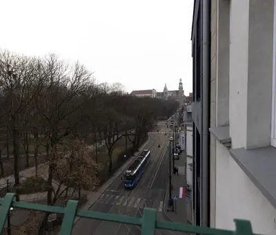 a view of a city street from a building at Oak Tree Old Town Apartments in Kraków