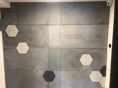 a tiled floor with the words piscql on it at Bella Casa Premium Apartment - 30 Pszczelna in Kraków