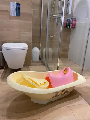a bathroom with a bath tub with a shower at Bella Casa Premium Apartment - 30 Pszczelna in Kraków