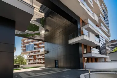 an external view of a building with balconies at Vistula Terraces Apartment in Kraków