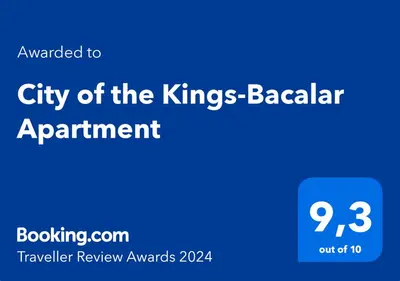 a blue sign that reads city of the kings babar apartment at City of the Kings-Bacalar Apartment in Kraków