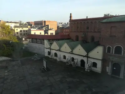 an overhead view of a building with a green roof at Szeroka View Apartment in Kraków