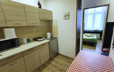 a kitchen with a counter and a microwave in it at The apartment in strict city center. Self check-in in Kraków