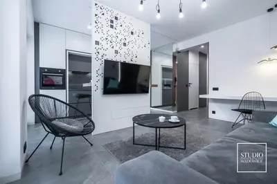 a living room with a couch and a table at Apartamenty Premium New in Wadowice