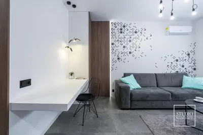 a living room with a couch and a table at Apartamenty Premium New in Wadowice