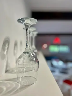 a clear glass vase sitting on a table at Old Tree Villa & Restaurant in Oświęcim