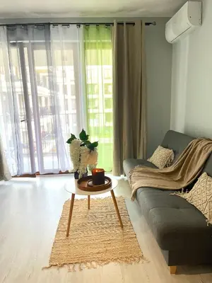 a living room with a couch and a coffee table at Way2Stay Rakowicka in Kraków