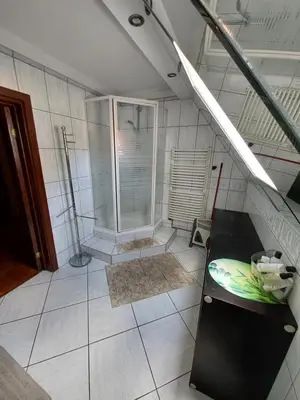 a bathroom with a shower and a sink at DOM KKK in Rabka
