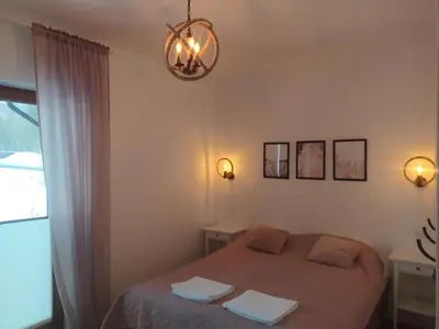 a living room with a couch and a fireplace at Między Wierchami in Ponice