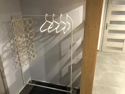 a room with a wall with utensils on it at FANTAZJA in Spytkowice