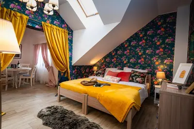 a small bedroom with two beds and a dresser at Pokoje w Starej Karczmie - by Upstairs in Liszki
