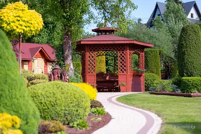 a gazebo in the middle of a garden at Kozinówka in Zawoja