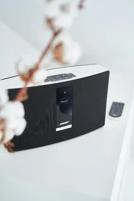 a microwave sitting on top of a white table at UNIQUE DESIGN Loft in middle of CENTRE of OLD TOWN with Netflix in Kraków