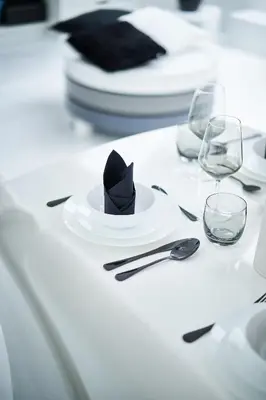a black hat on a white plate on a table at UNIQUE DESIGN Loft in middle of CENTRE of OLD TOWN with Netflix in Kraków