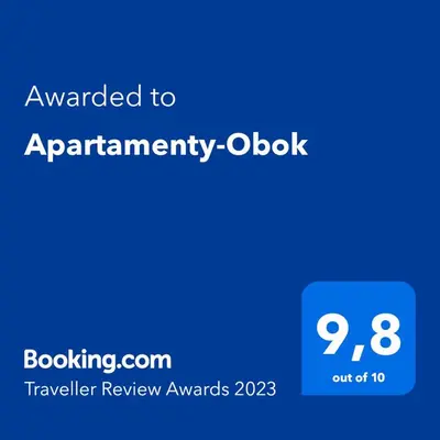 a blue screen with the text awarded toarrantery at Apartamenty-Obok in Zator