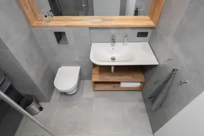 a bathroom with a sink and a toilet at Stylish Apartment Luminis in Krakow's Kazimierz in Kraków