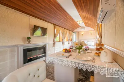 a kitchen with a counter and a sink in a room at Stacja Galicja - nocleg w pociągu blisko Energylandia in Zator