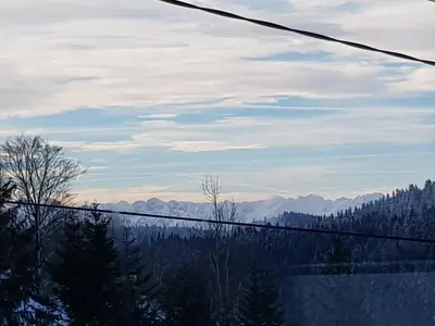 a view of the mountains from a ski lift at Na Zakręcie in Ochotnica Górna