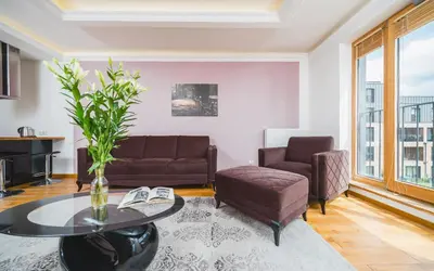 a label for a brand with the words bon tum university at Glam Brewery Suite - Deluxe Apartment with Parking - by Upstairs in Kraków