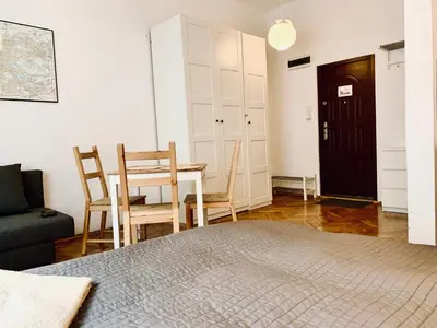 a bathroom with a toilet and a shower at Studio in Center in Kraków