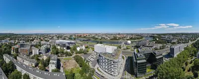 an aerial view of a city with tall buildings at WawelSee Apartments in Kraków
