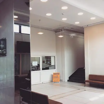 a room with a sign in the middle of a building at Piast Hotele Studenckie in Kraków