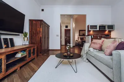 a living room with a couch and a table at Szpitalna 20 Apartment nr 8 in Kraków