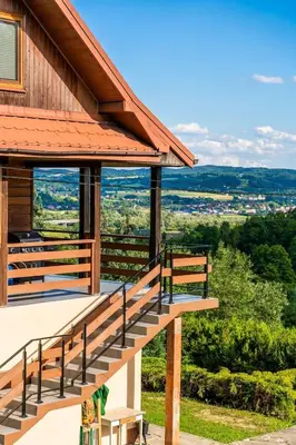 a stairway leading up to a house with a view at Willa Sulimówka - wyjątkowy dom na wyłączność Mini SPA in Zakliczyn