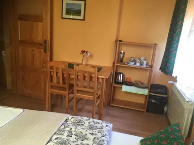 a bathroom with a shower and a toilet at MARYSIEŃKA in Zawoja