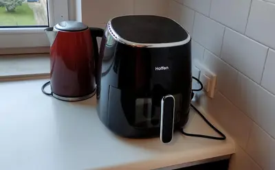 a appliance sitting on a counter next to a coffee maker at Pleasant private and fully equipped apartment with private parking space close to District Kazimierz in Kraków