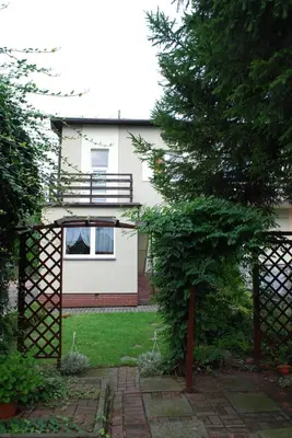 a view of a house from the garden at Villa For You in Oświęcim