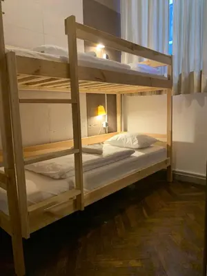 a couple of bunk beds in a room at VIKI Kazimierz in Kraków