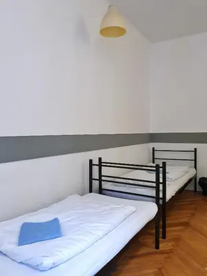 a bedroom with two bunk beds in a room at VIKI Kazimierz in Kraków