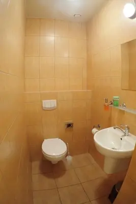 a bathroom with a toilet and a sink at Nawojka Hotele Studenckie in Kraków