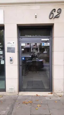 a store front with the door open on a street at Sunflower Apartment Old Town in Kraków