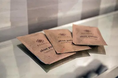 two brown napkins sitting on top of a table at Apartament 6 piętro in Kraków