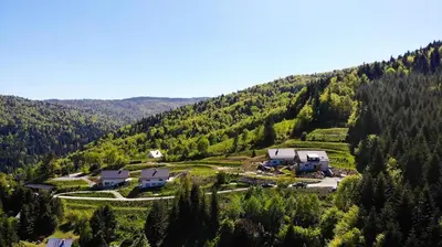 an aerial view of a house in a mountain at Gorczańskie Zacisze in Lubomierz