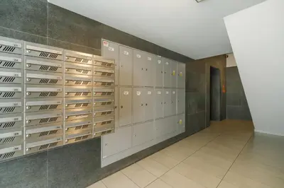 a locker room with a bunch of lockers at Studios Lubelska Kraków by Noclegi Renters in Kraków