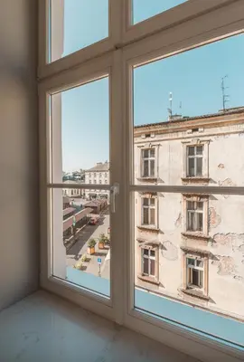 a window with a view of a building at Hotel Estera in Kraków