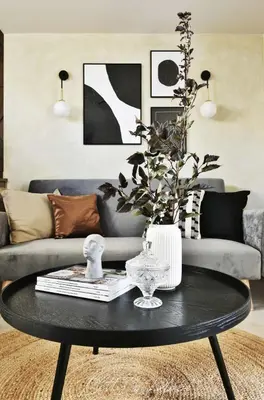 a living room with a couch and a coffee table at Betty's Place in Zabierzów