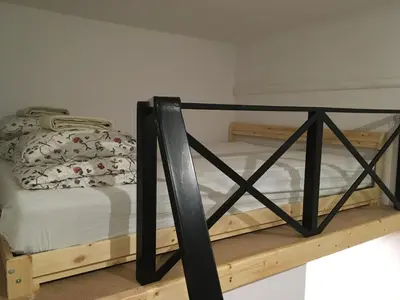 a bedroom with two bunk beds in a room at Main Square Apartaments in Kraków