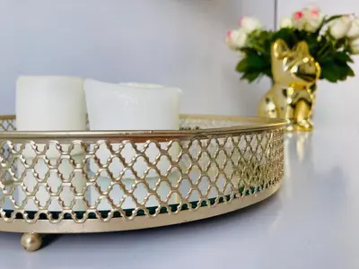a gold tray with candles and a vase with flowers at Duo 2 Debniki Modern Apartment near Old Town Fast Wi-Fi Self Check-in in Kraków