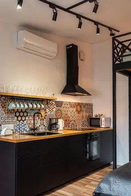 a kitchen with a sink and a counter top at Modern APARTMENT ARIZONA STUDIO OLD TOWN Dietla balcony in Kraków