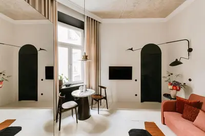 a living room with a couch and a table at Stylish apartment close to Wawel, Old Town Studio, Main Sq. 3 min in Kraków