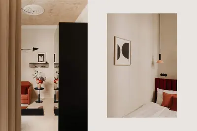 a bedroom with a white wall and a bed in a room at Stylish apartment close to Wawel, Old Town Studio, Main Sq. 3 min in Kraków