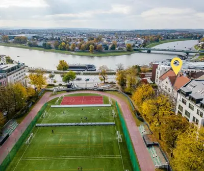 an aerial view of a tennis court next to a river at Stylish apartment close to Wawel, Old Town Studio, Main Sq. 3 min in Kraków