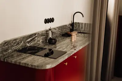 a kitchen counter with a sink in a room at Stylish apartment close to Wawel, Old Town Studio, Main Sq. 3 min in Kraków