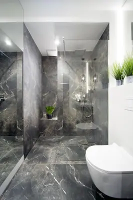 a bathroom with a sink and a toilet in it at Jacuzzi Apartment Main Square in Kraków